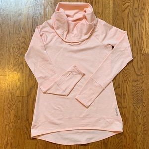 Pink Reebok long sleeve athletic shirt.